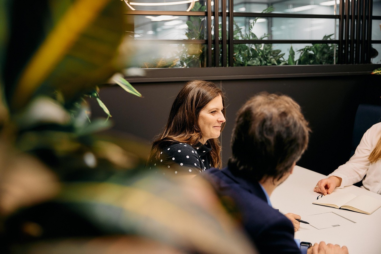 Women and man in finance meeting